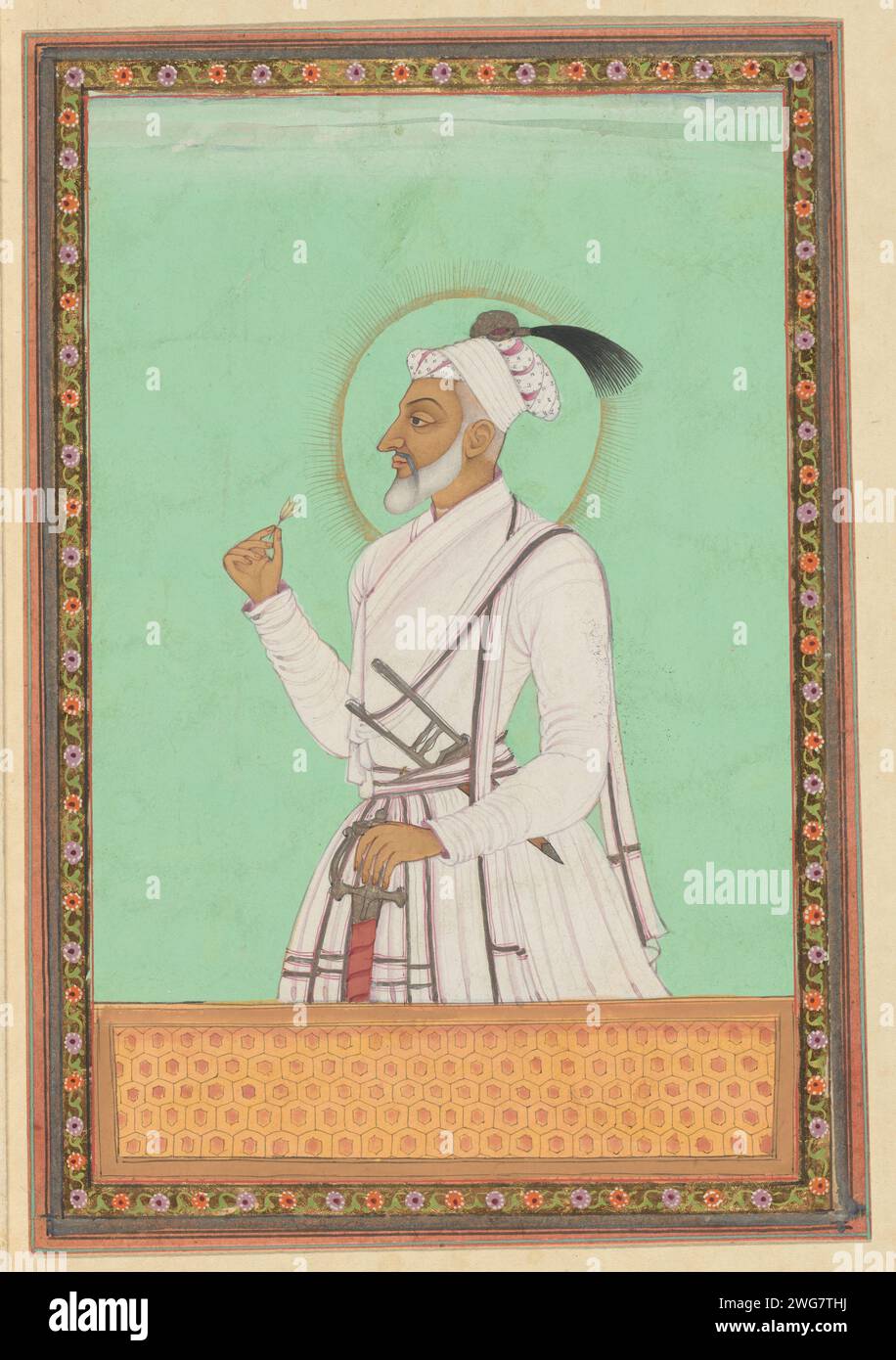 Portrait of Aurangzeb, youngest son of Shah Jahan, who ruled the province of Deccan in the time of his father, and after the death of his father rules all over Delhi after he killed all three of his brothers., C. 1686 drawing. Indian miniature Aurangzeb with white beard is depicted up to his hips, used to the left, with his left hand on his sword and in his right hand a flower, a kattar in his belt. Page 6 in the `Witsen-Album ', with 49 Indian miniatures of princes. Above the portrait a piece of paper with the name in Persian. Under the portrait a piece of paper with the name in the Portugues Stock Photo